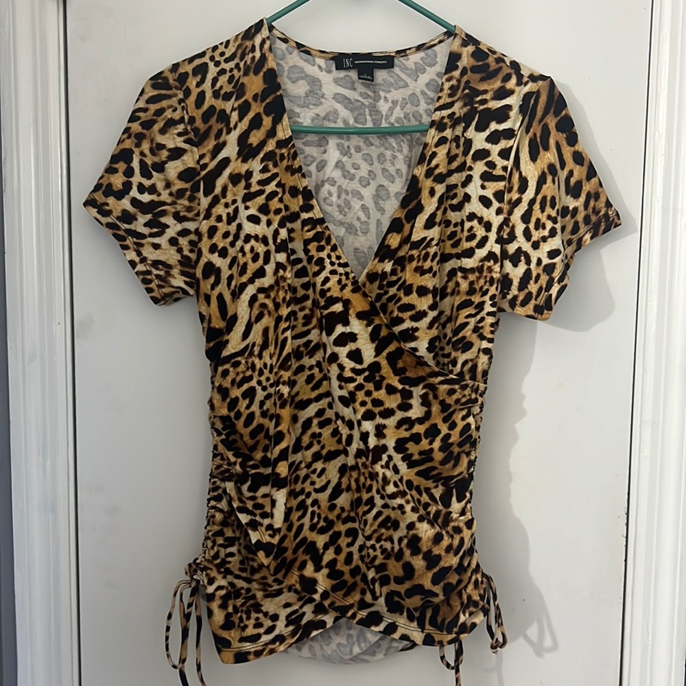 Animal print vneck top. Size large